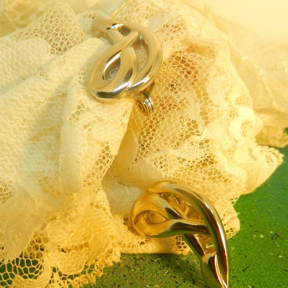 Vintage Jewelry - VTG Monet silver clip earrings swirly looped knots silver tone dressy studs glam